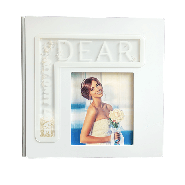 Wedding album with magnetic sheets
